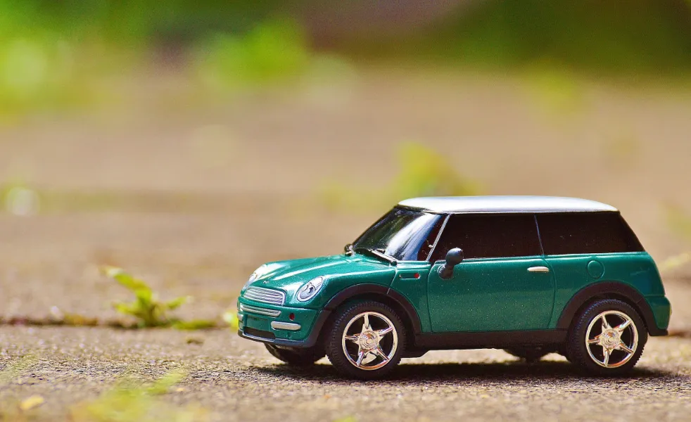 A green mini toy car