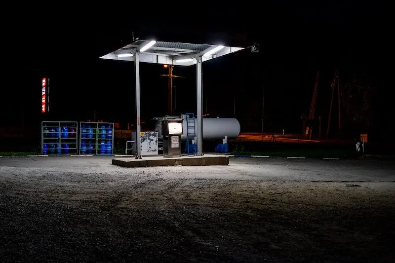 A small gas station at night